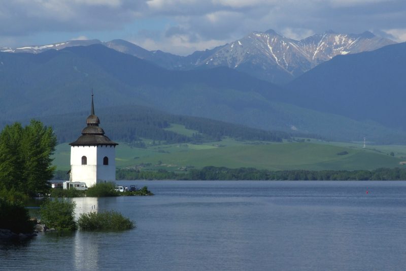 Liptovská Mara dam with the church tower of the sunken village (2010)